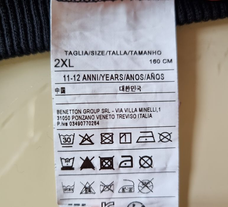 Джемпер черный с принтом Rockstar (Benetton), на девочку  11- 12 лет.