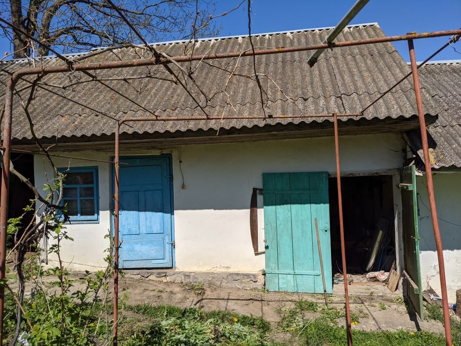 Будинок, присадибна ділянка та город