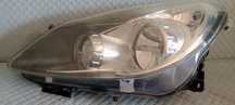 Reflektor lewy opel corsa D czarny valeo