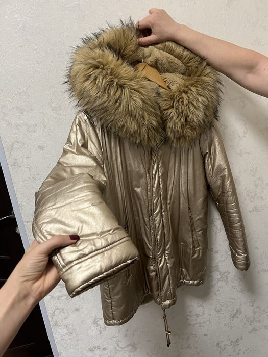 Зимова жіноча куртка з натуральним хутром