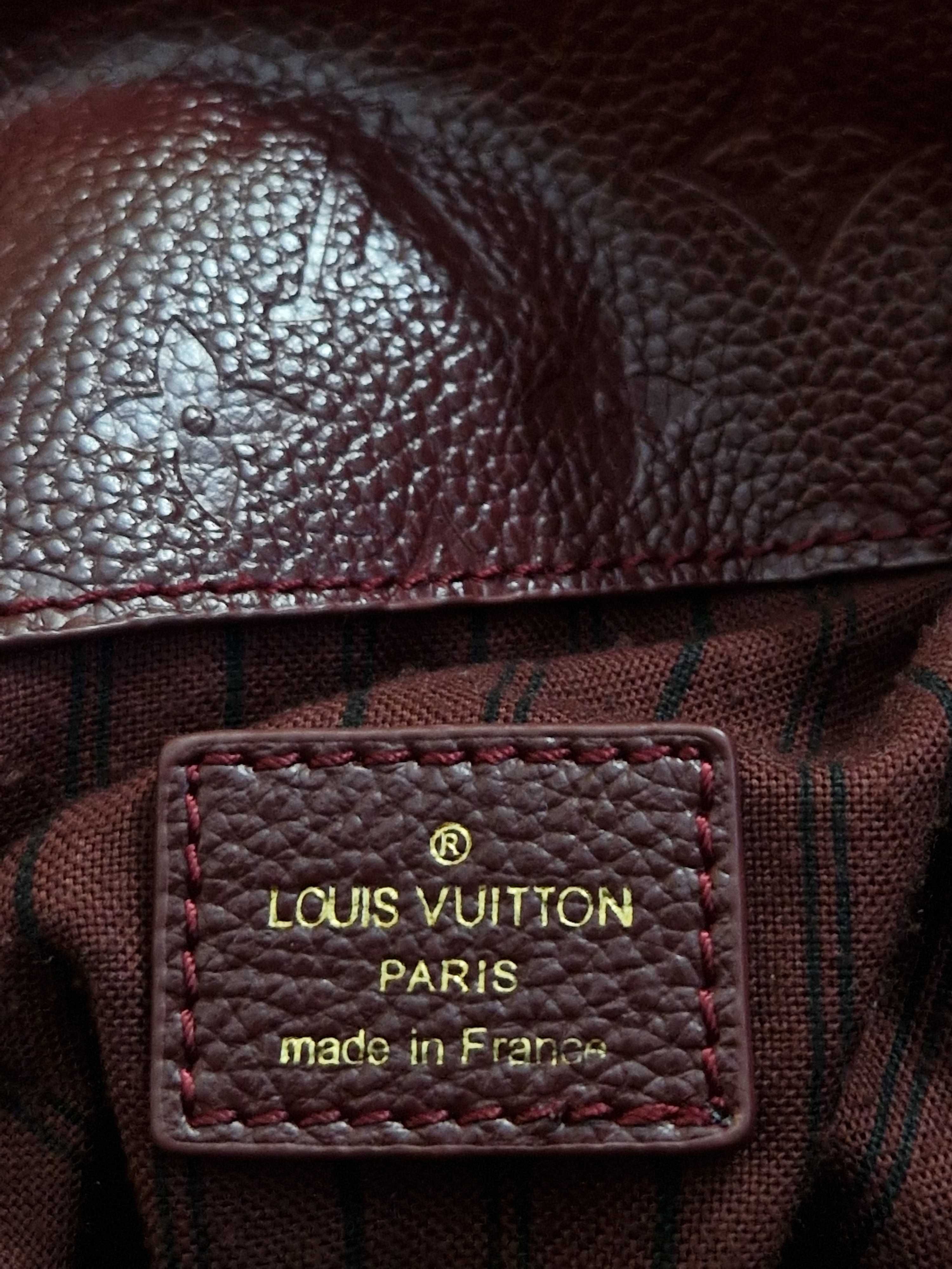 Кожаная сумка Louis Vuitton