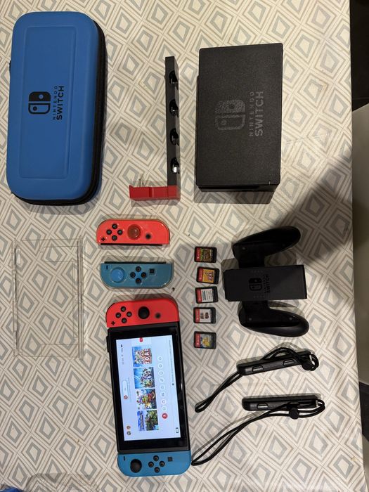 Nintendo Switch + Acessorios + Joycons Extra e 5 Jogos
