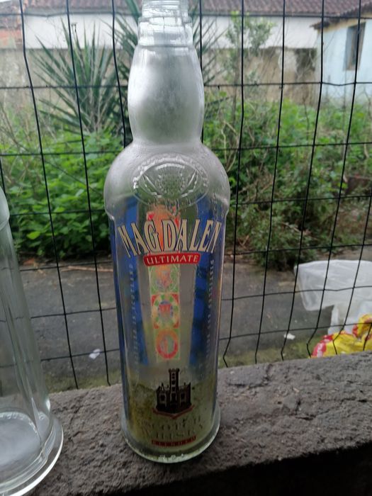 Garrafas de vidro grandes