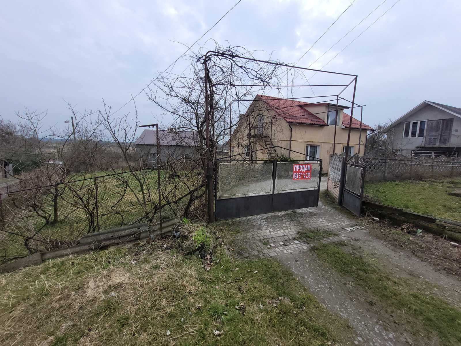 Житловий будинок та земельна ділянка 10 сот. м. Кам'янка-Бузька