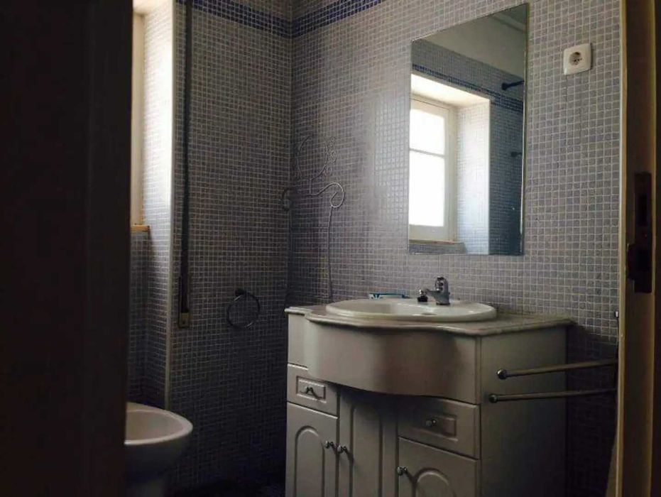 Quarto com varanda em Coimbra