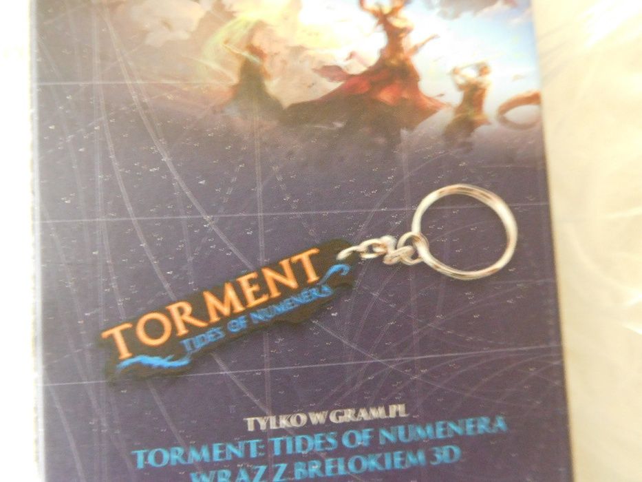 Breloczek: "Torment Tides of Numenra" - Nowy Oryginalnie zapakowany