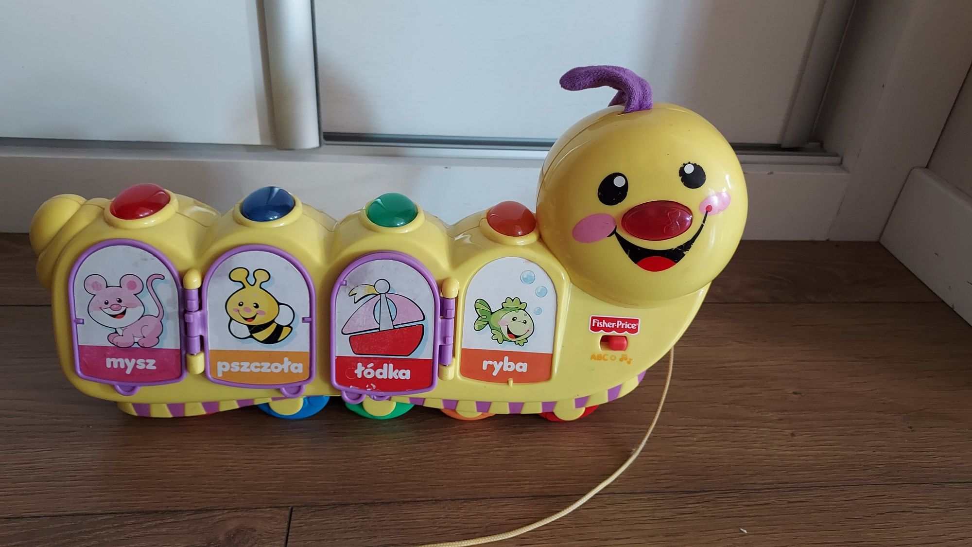 Gąsienica Fisher Price