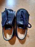 Sapatos de carneira