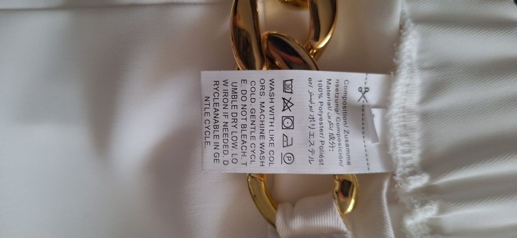 Szerokie spodnie eleganckie XL kremowe