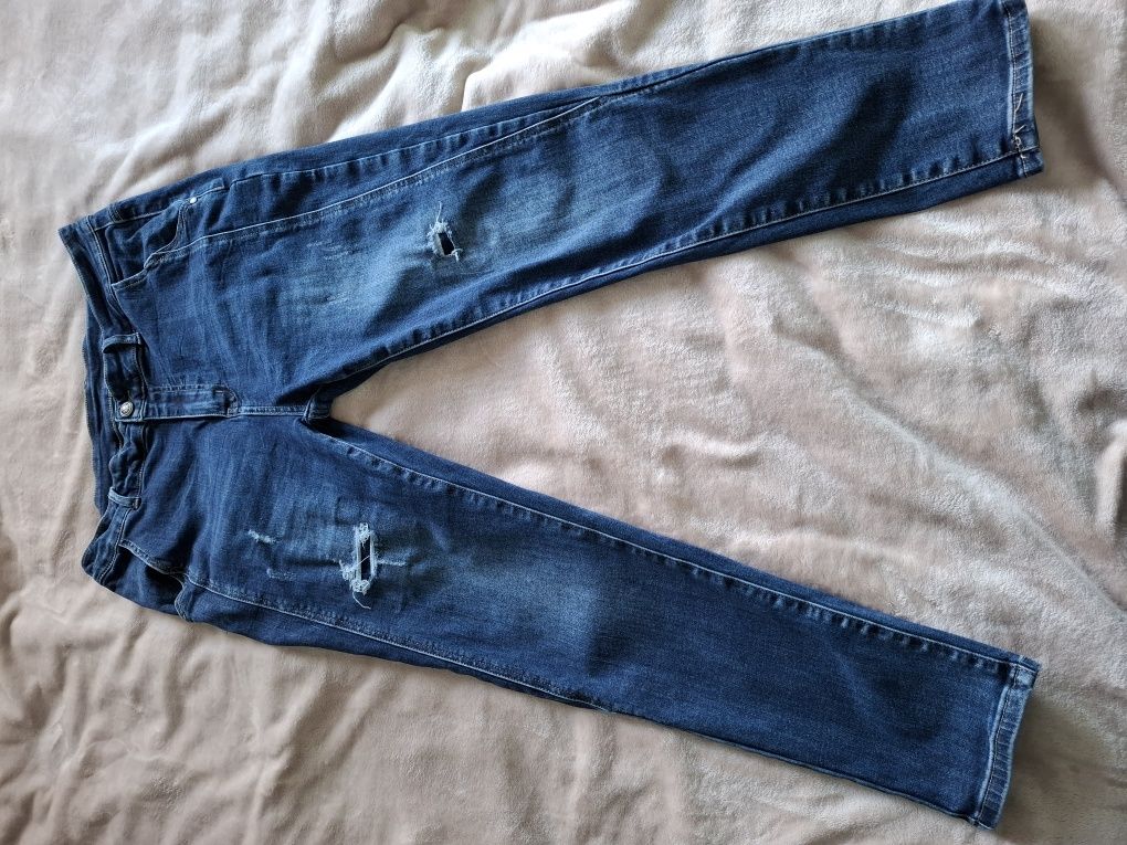 Jeansowe granatowe spodnie z podszytymi dziurami r.xl + gratis