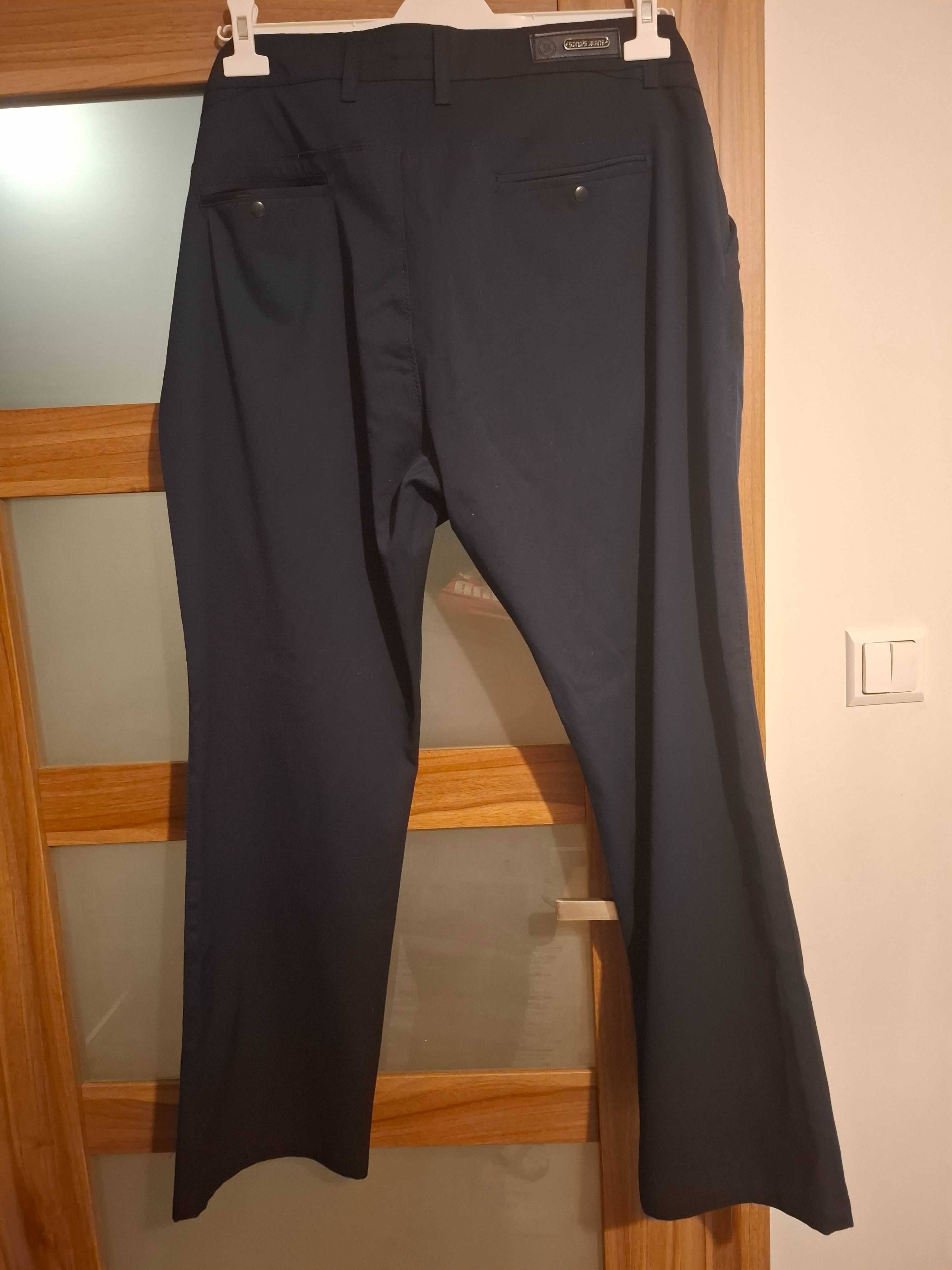 Eleganckie proste spodnie garniturowe męskie W42