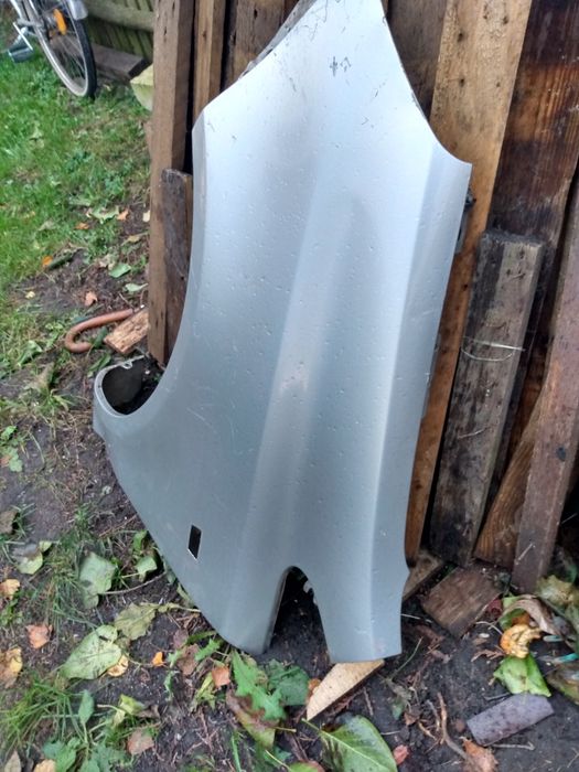 Błotnik przedni lewy Corsa D