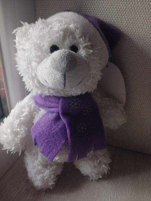 Ведмідь середня ,м'яка  нова іграшка.