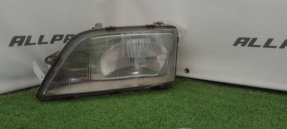 Передня ліва фара 90337332 – Opel Omega A (б/у)