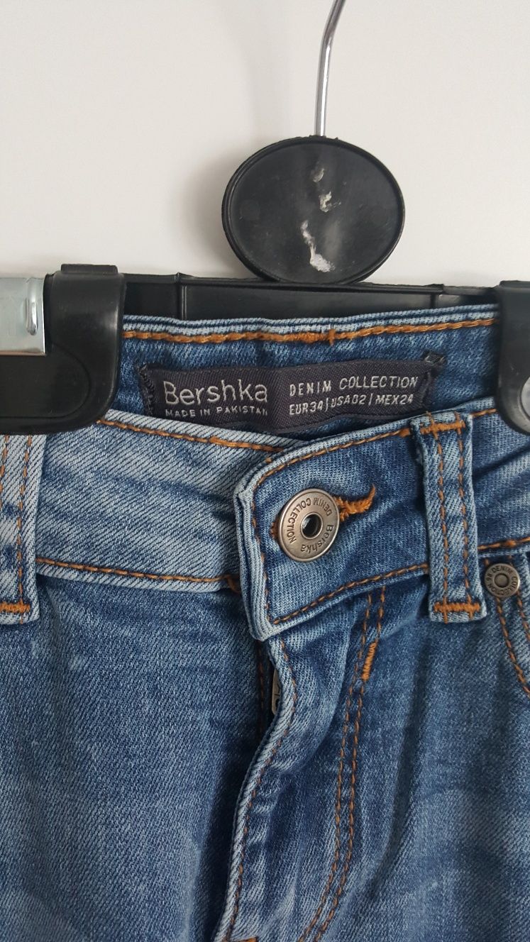 Spodnie jeansy fabryczne dziury Bershka r.34 xs