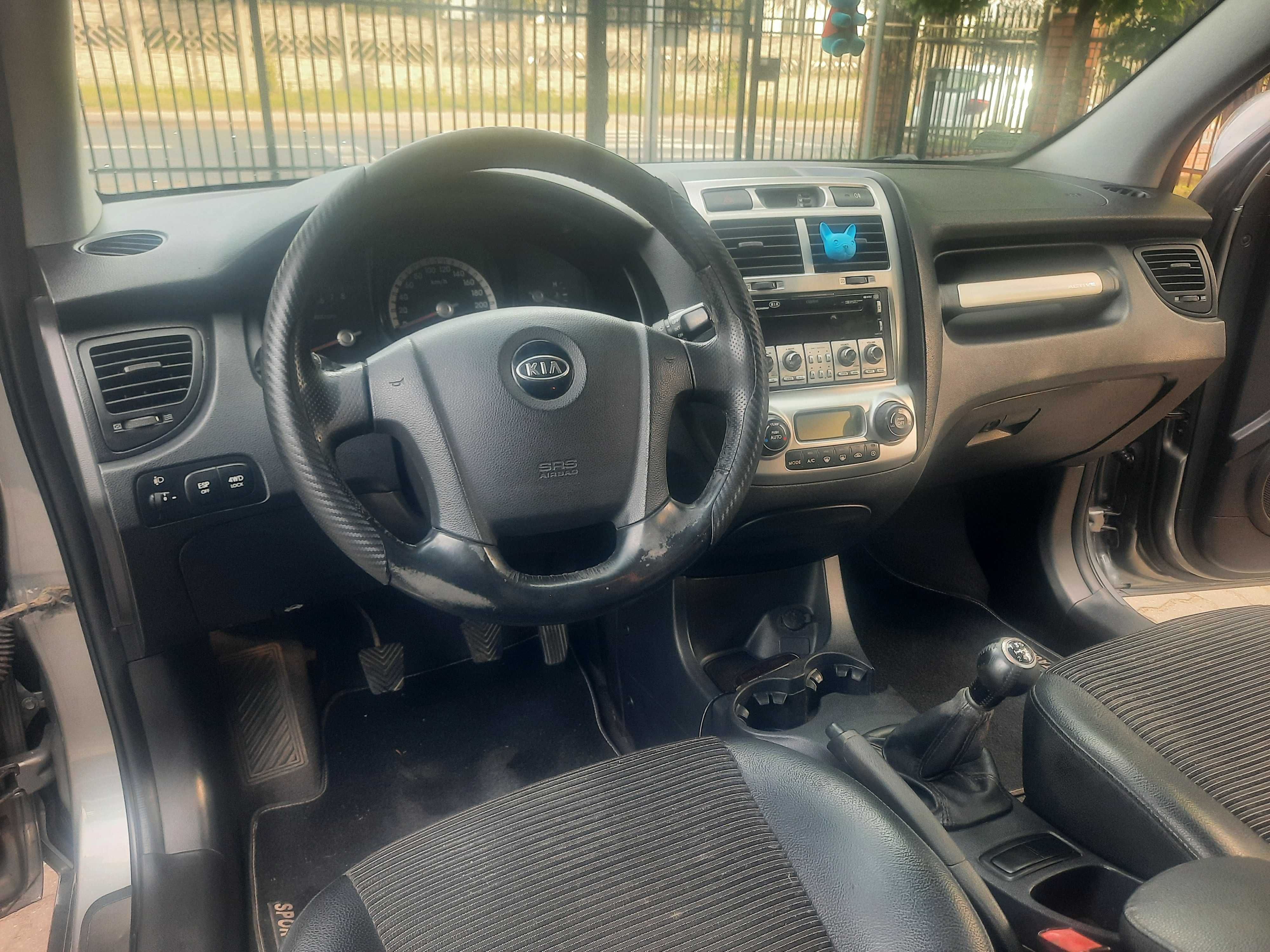 Kia Sportage 2008 r. + 4 opony zimowe