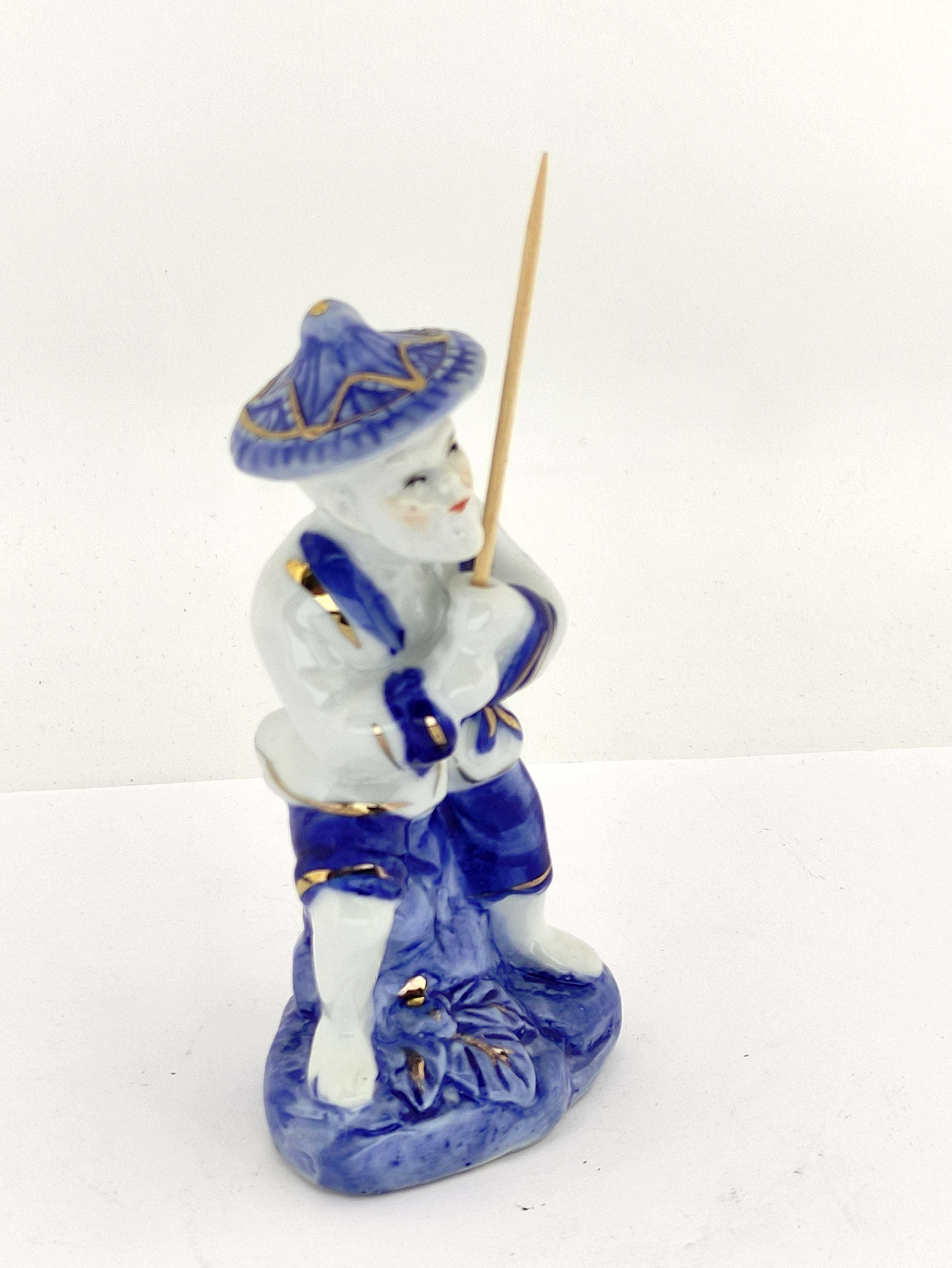 Pescador em Porcelana Chinesa