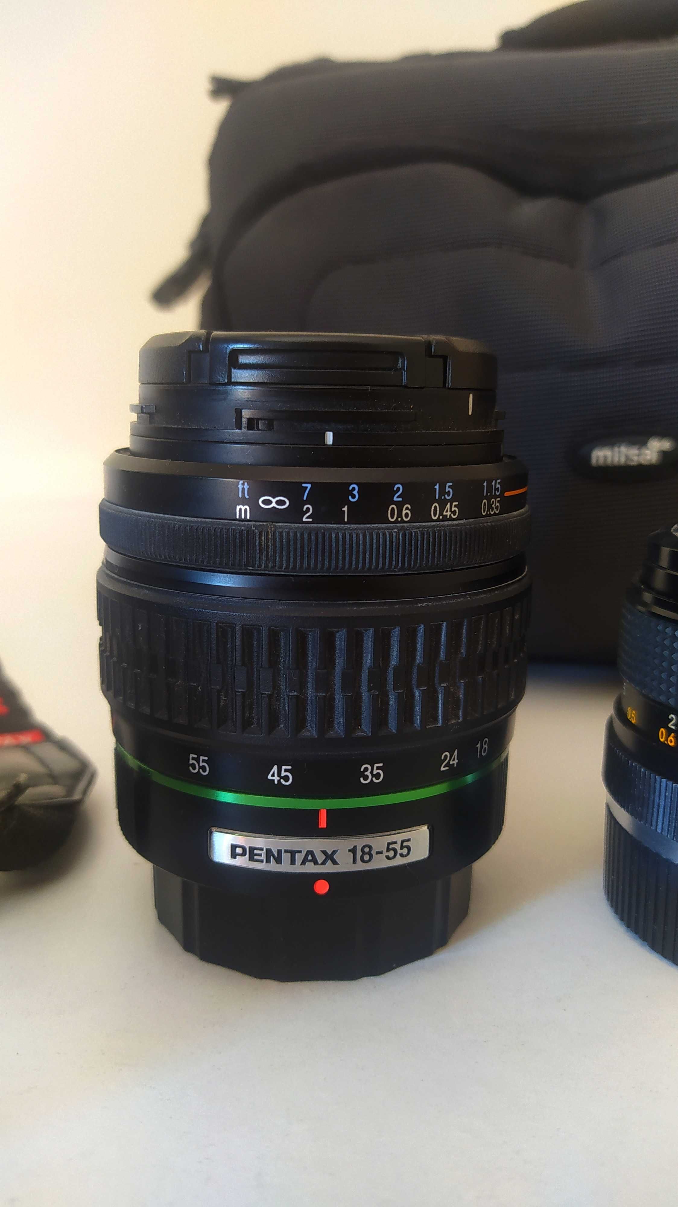 Máquina fotográfica Pentax K-x com lentes e extras