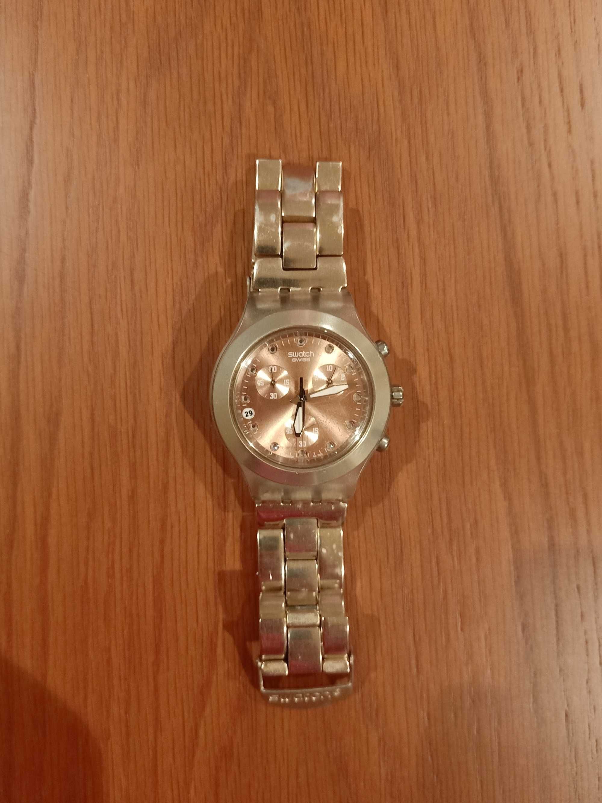 Relógio Swatch dourado