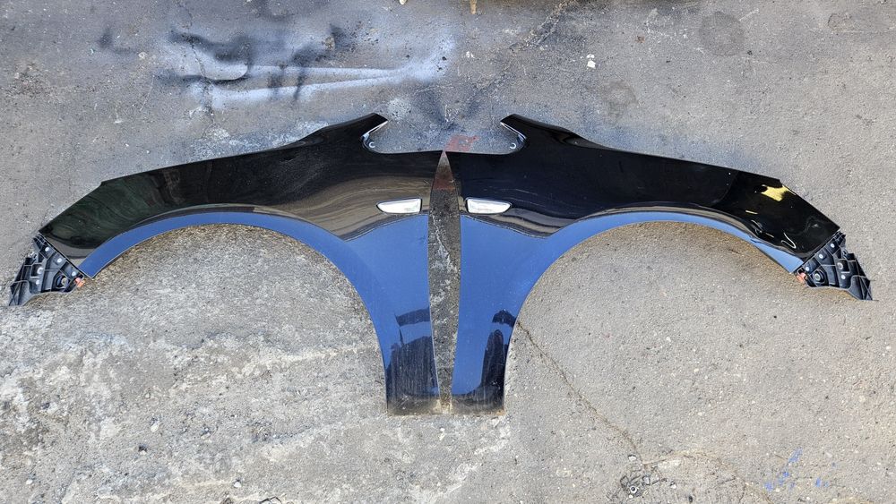 Błotnik lewy prawy przód przedni z20r opel astra j IV 4 czarny