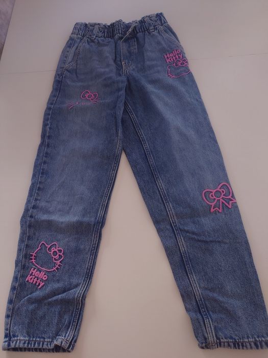 Śliczne spodnie dżinsowe Hello Kity, H&M, r.134