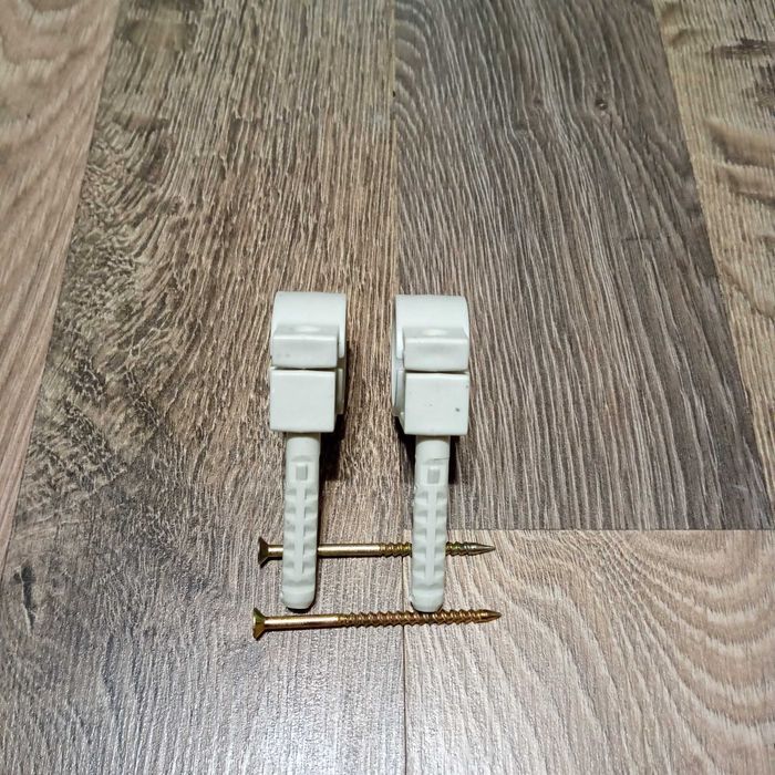 Тримач (обойма) для труб (кабелю) 25-27мм