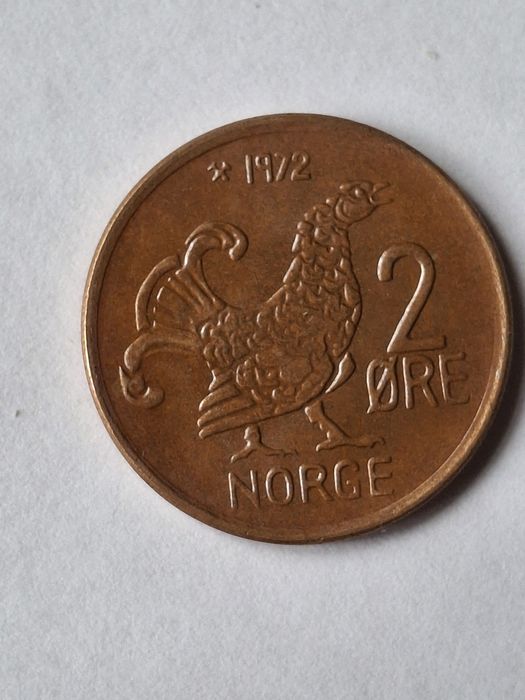 Dziesięć monet z motywami zwierząt.