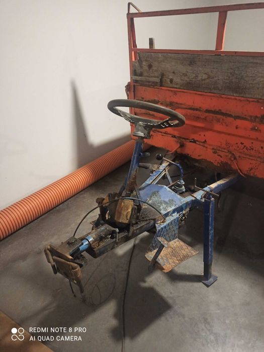 Reboque motocultivador basculante