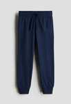H&M nowe spodnie joggersy 134