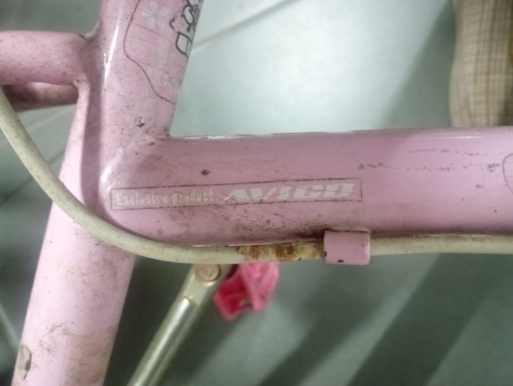 Bicicleta rosa menina