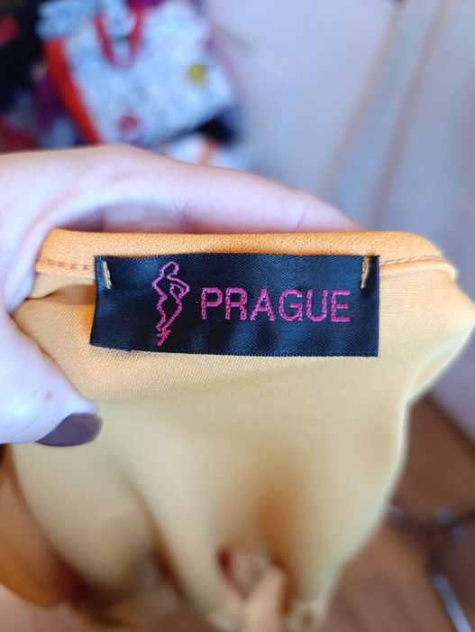 Pomarańczowa narzutka żakiecik