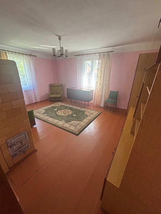 Nieruchomosc zabudowana domem w spokojnej okolicy z budynkami