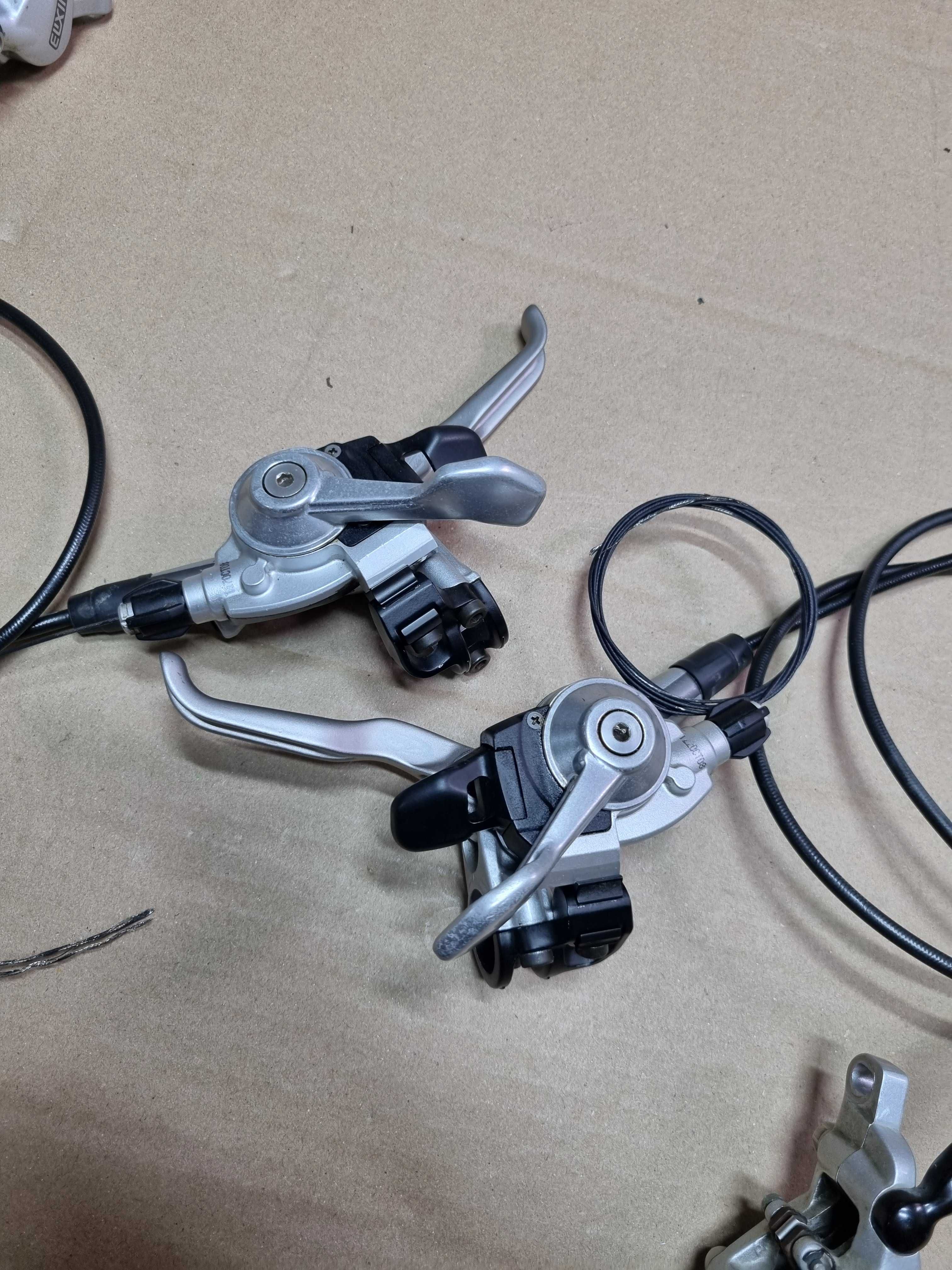 Hamulce hydrauliczne Avid Elixir R plus manetki Sram X-9