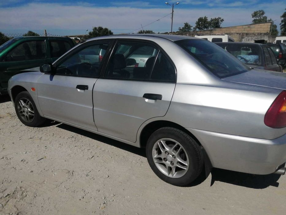 Para peças Mitsubishi Lancer VI 1.3 12V ano 1999