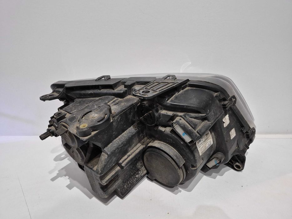 VW Amarok (2H) 12-16 Lampa reflektor lewy przód Europa 9PIN oryginalny