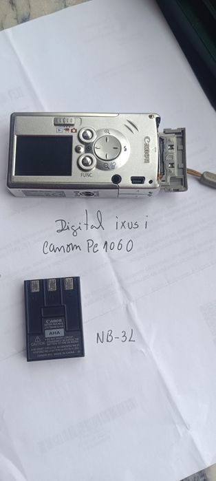 Máquina ixus i Canon PC 1060