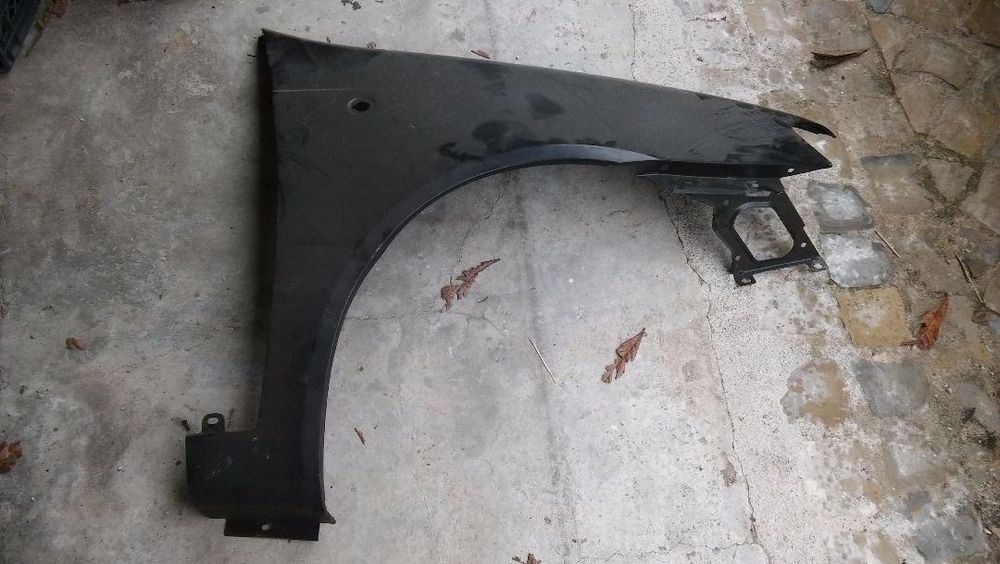 Guarda lamas fiat punto ano 2001