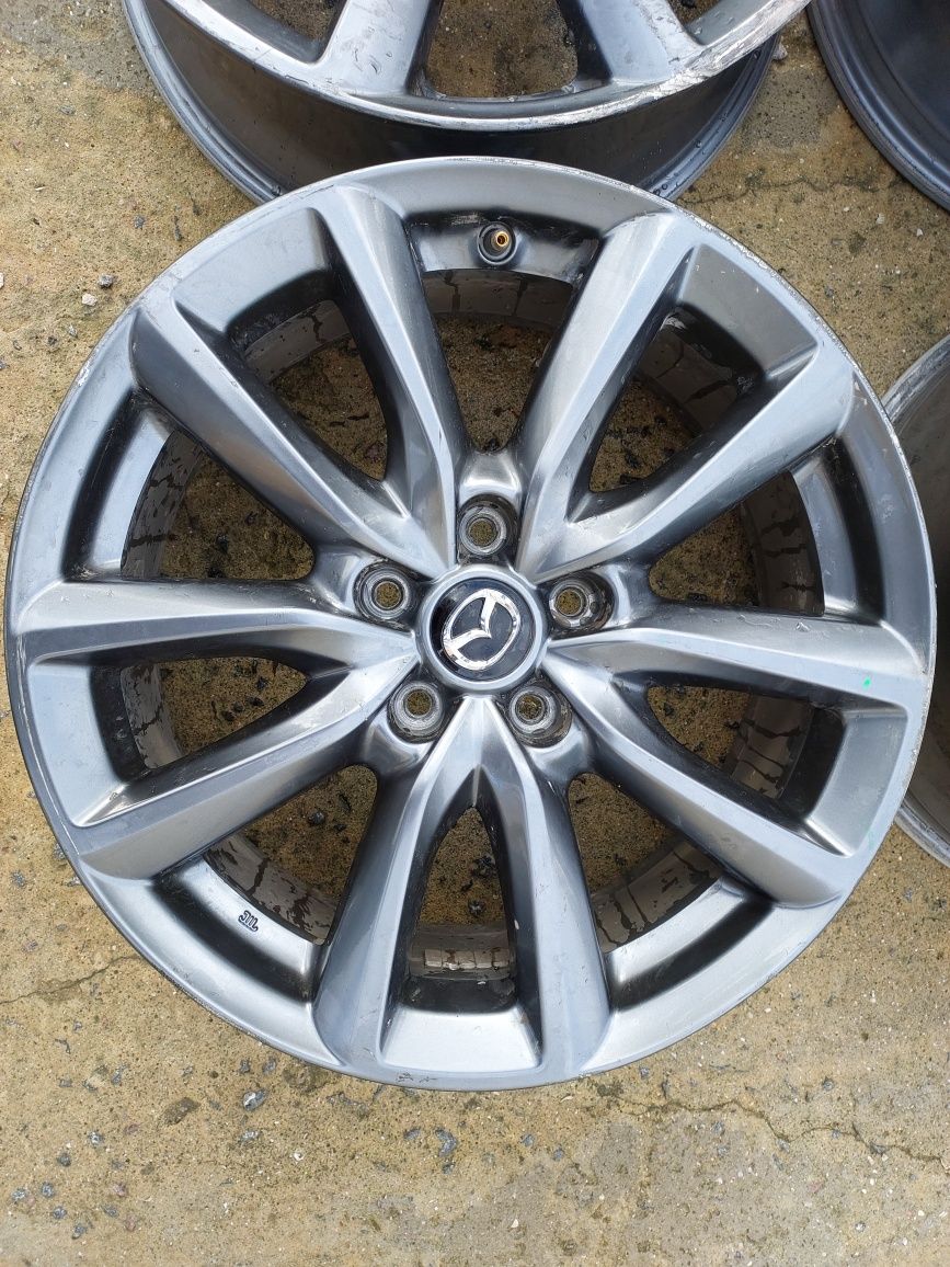 Диск Mazda оригинал . R18 W7.0 PCD5x114.3 ET48 DIA67.1