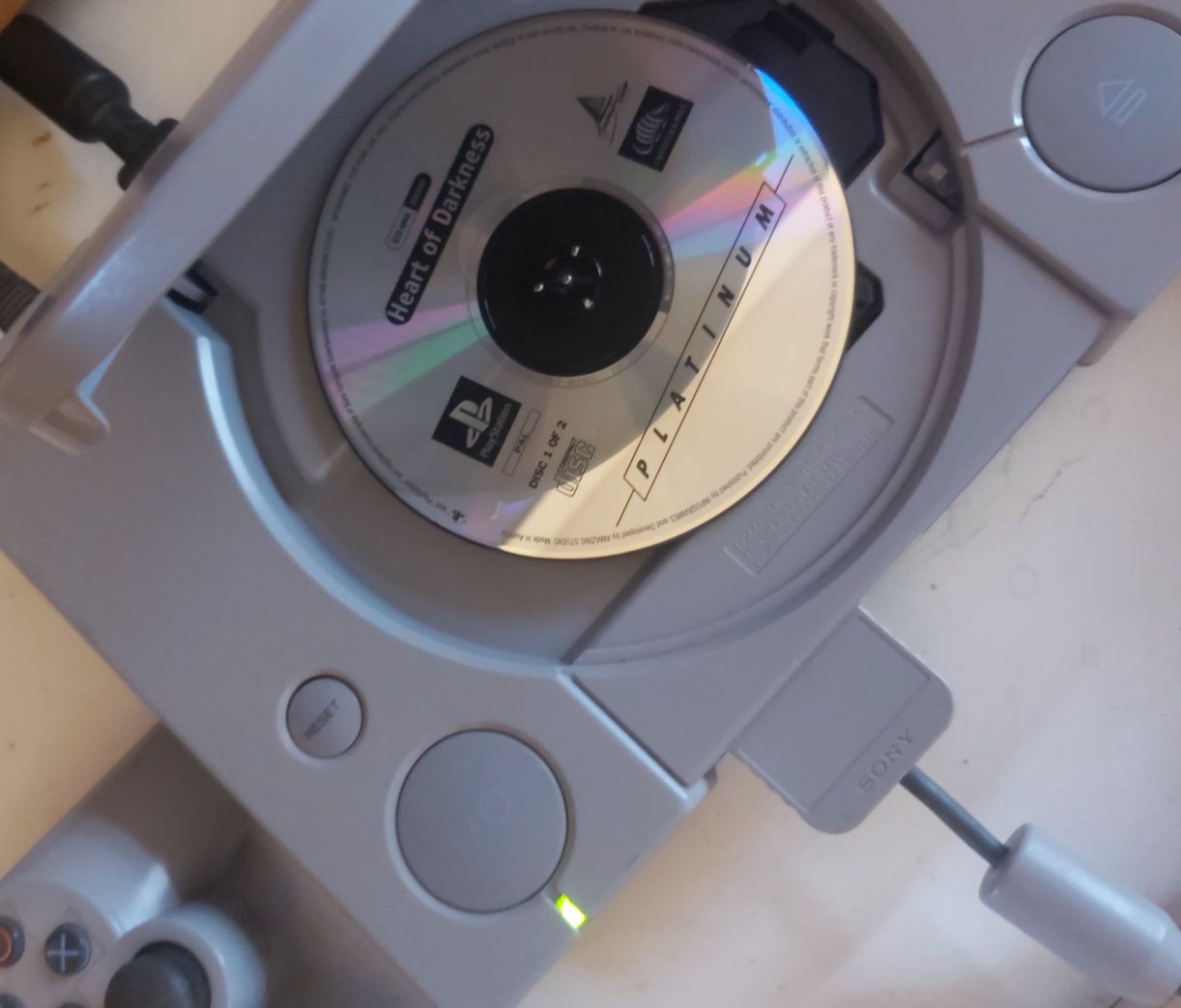 Ps1 fat com Jogos pistola cartão de memória e comando original.