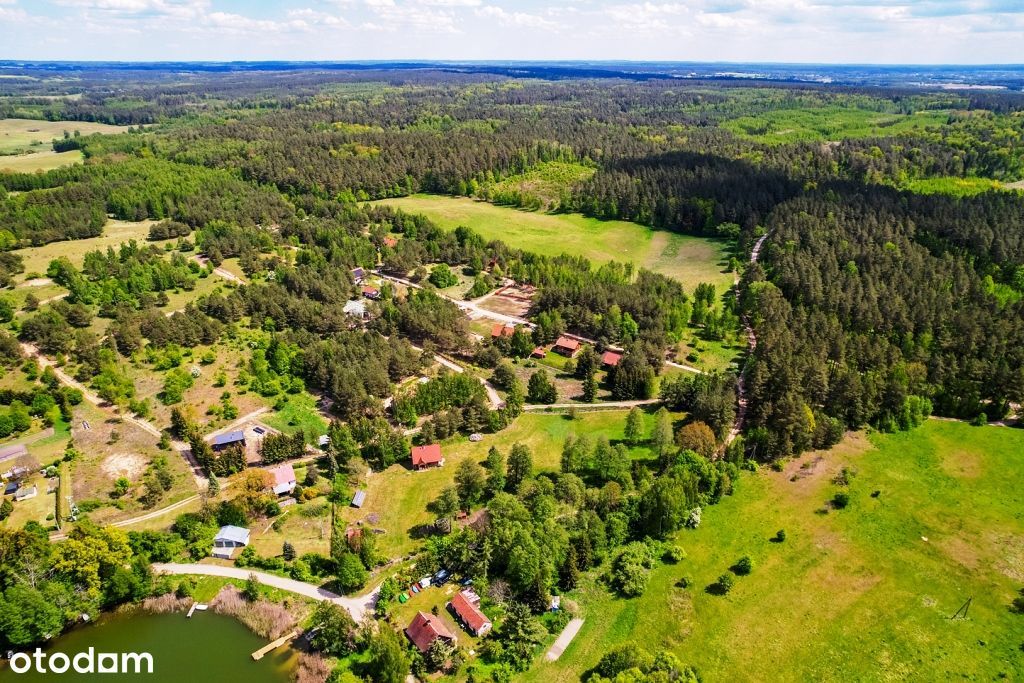 Piękne działki w otoczeniu krzewów z dostępem do jeziora Buwełno