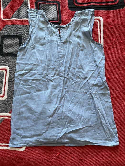 Blusa com detalhes de flor