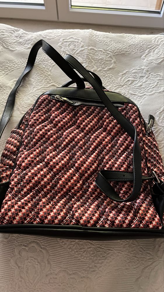 Mochila pequena parfois a venda