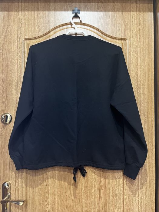 Жіночий світшот.