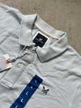 Błękitna koszulka Polo firma Polo Crew Clothing Company roz. L