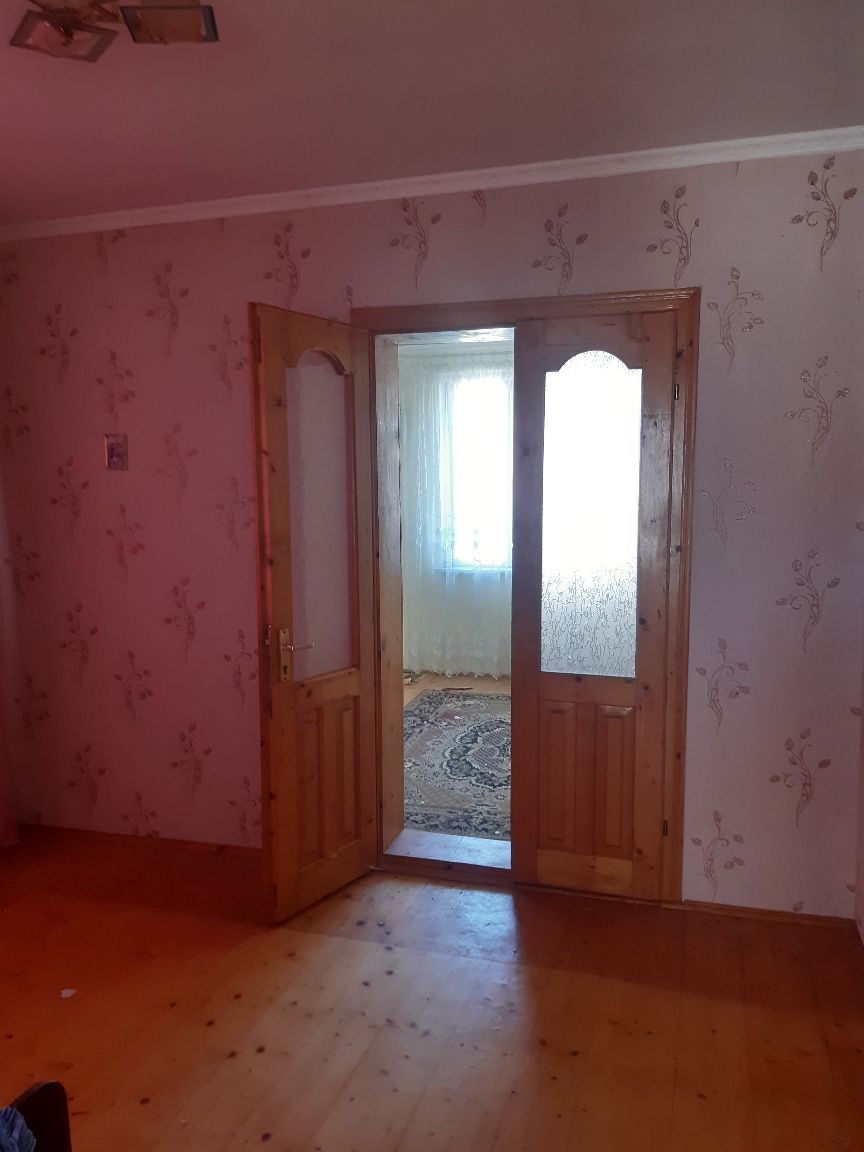 Двоповерховий будинок