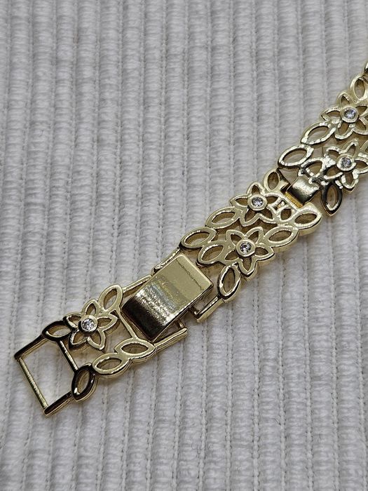 Bransoletka ażurowa kwistki z cyrkoniami stylizowana na Apart kolor zł