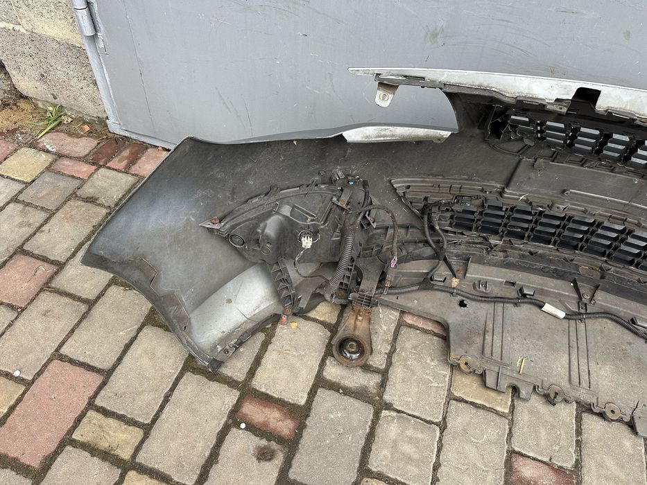 Бампер передний Opel Astra 2009-