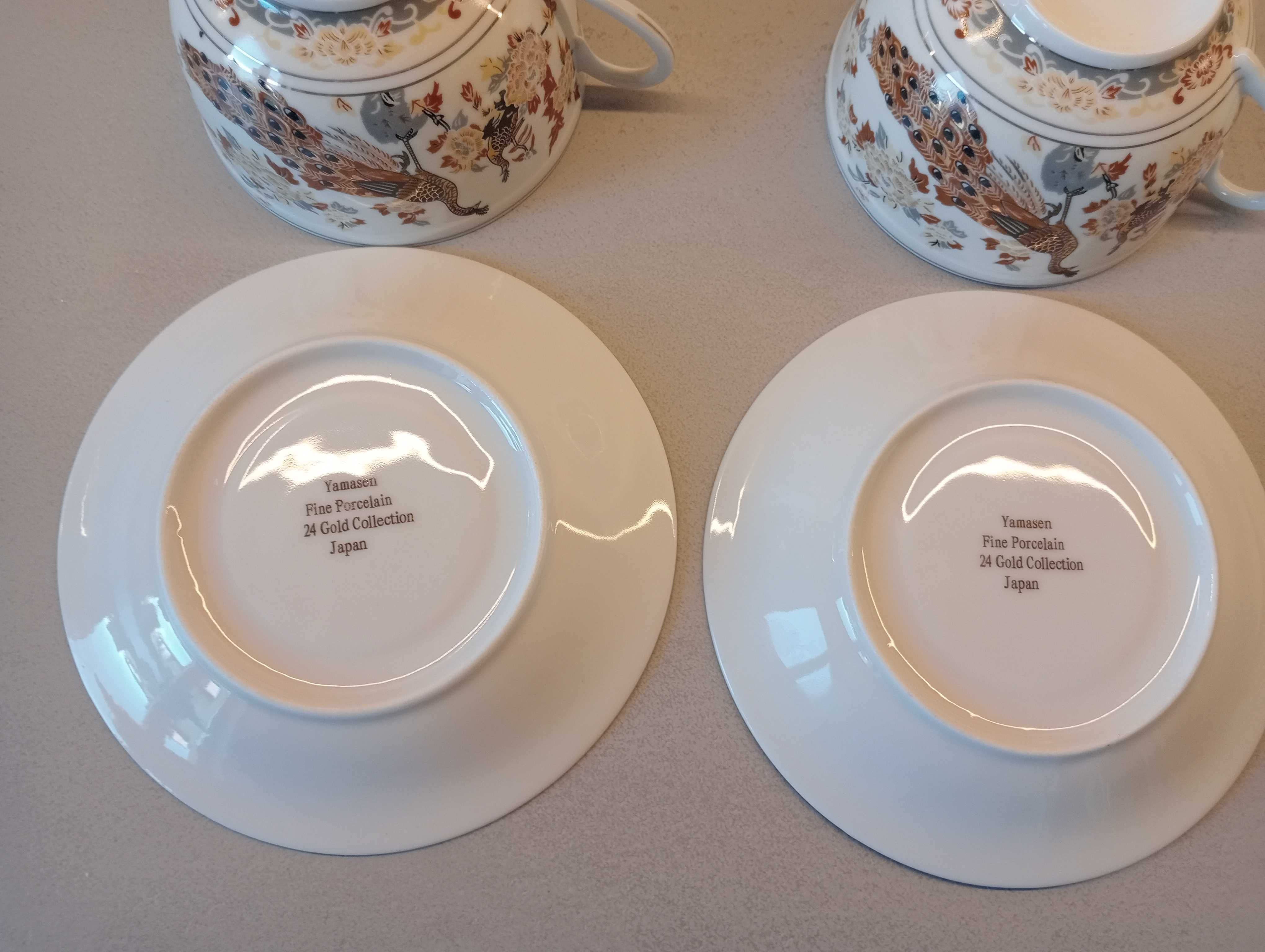Porcelanowe filiżanki ze spodkiem (dwie sztuki)