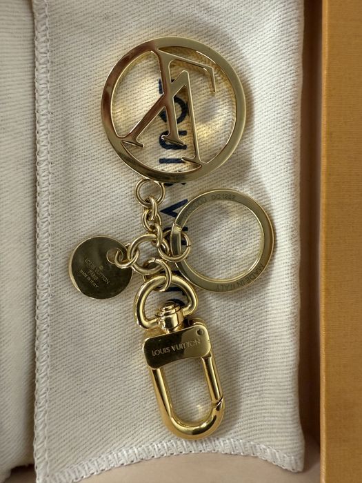 Breloczek Louis Vuitton z paragonem