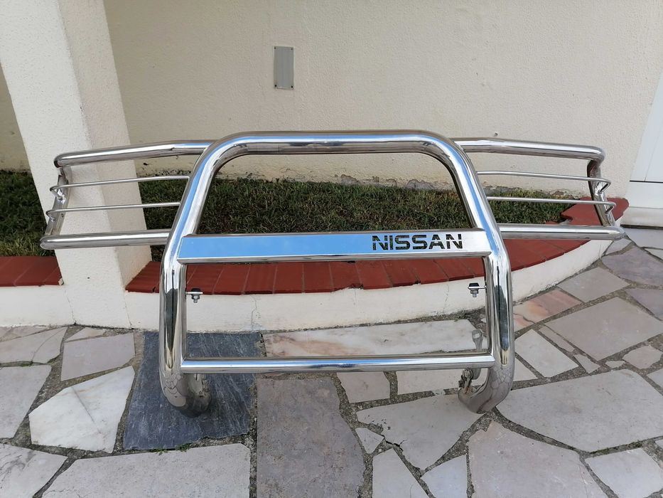 Grelha de protecção de faróis Nissan